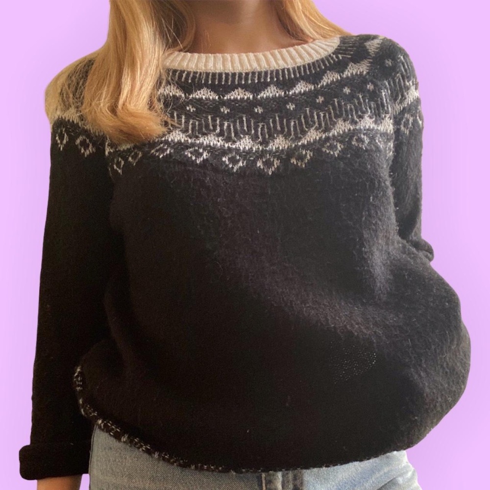 Urban Outfitters sweater with very festive patterns.